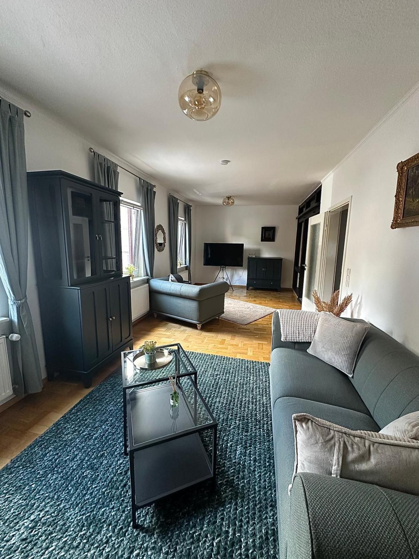 Four-Bedroom Apartment with Balcony 