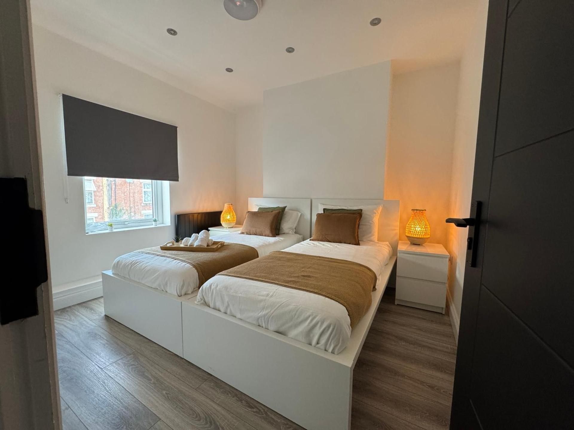 Four-Bedroom Apartment with Balcony 