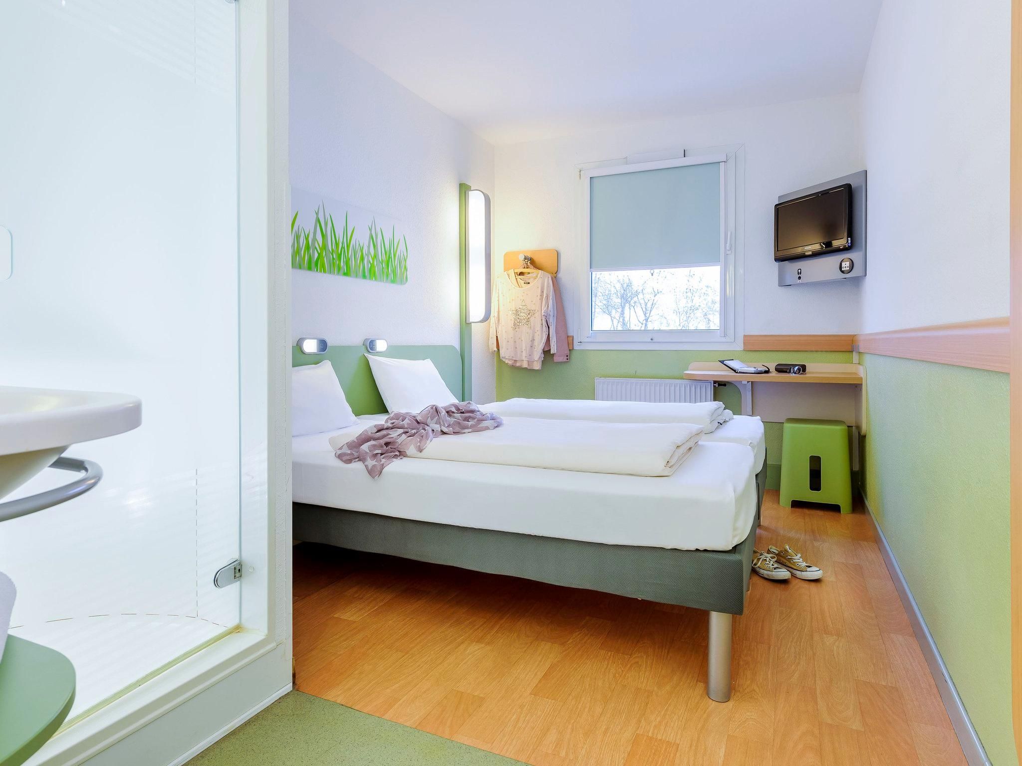 TWIN - room with two single beds for up to 2 people.