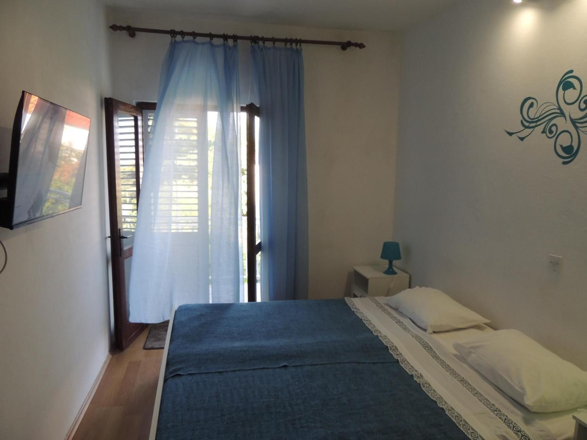 One-Bedroom Apartment with Balcony and Sea View