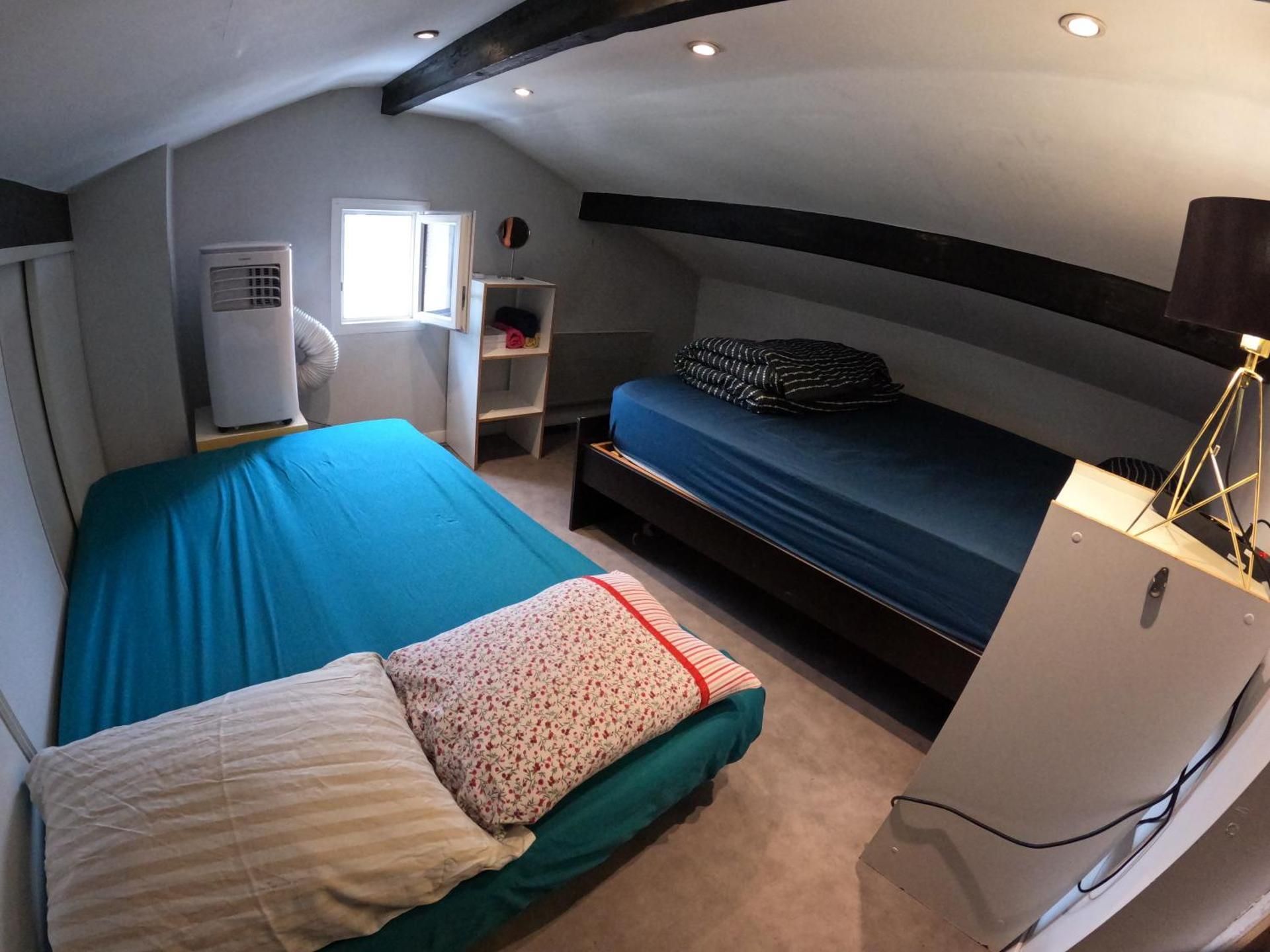 Economy Quadruple Room with Shared Bathroom