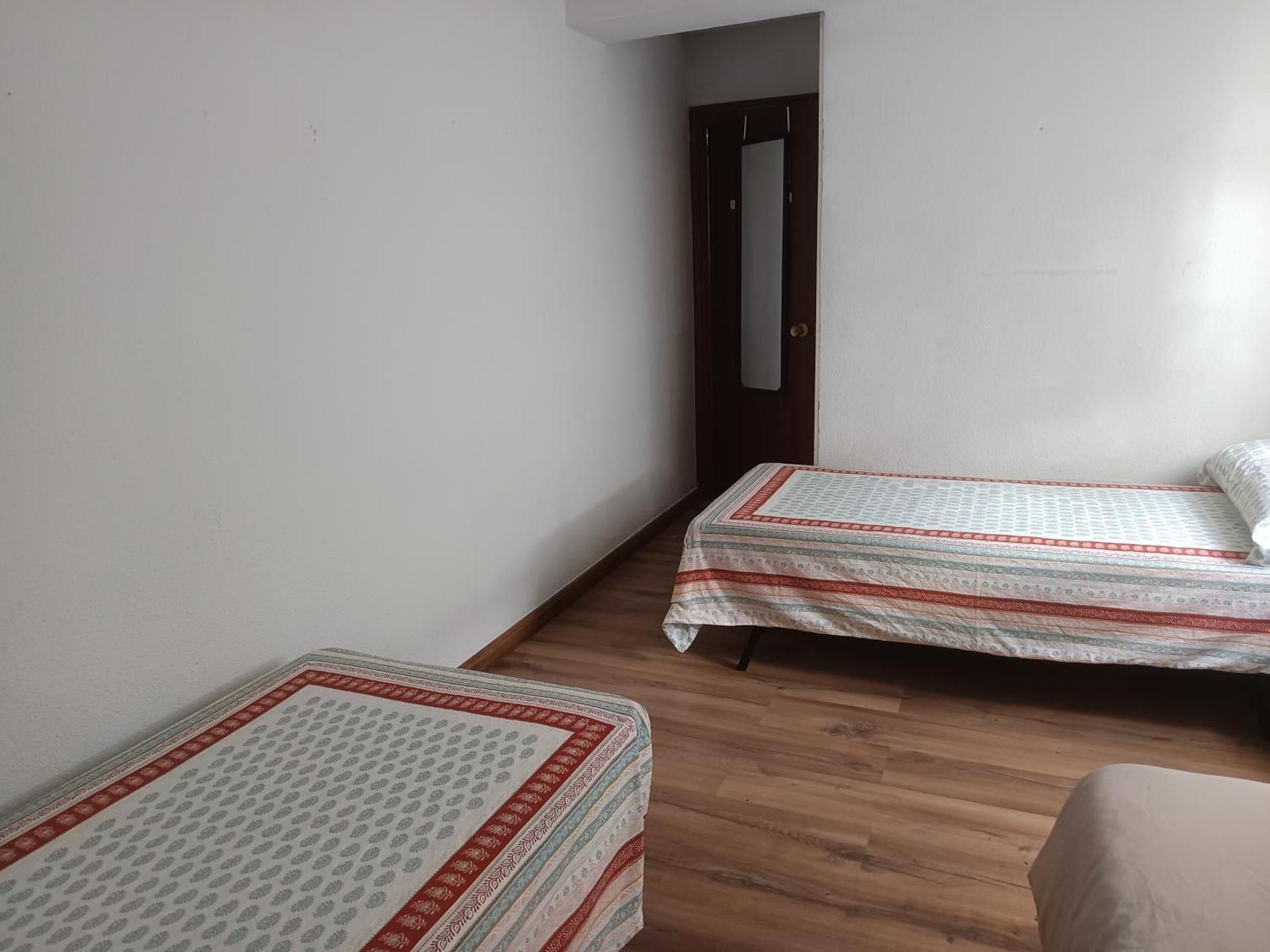 Triple Room with Shared Bathroom