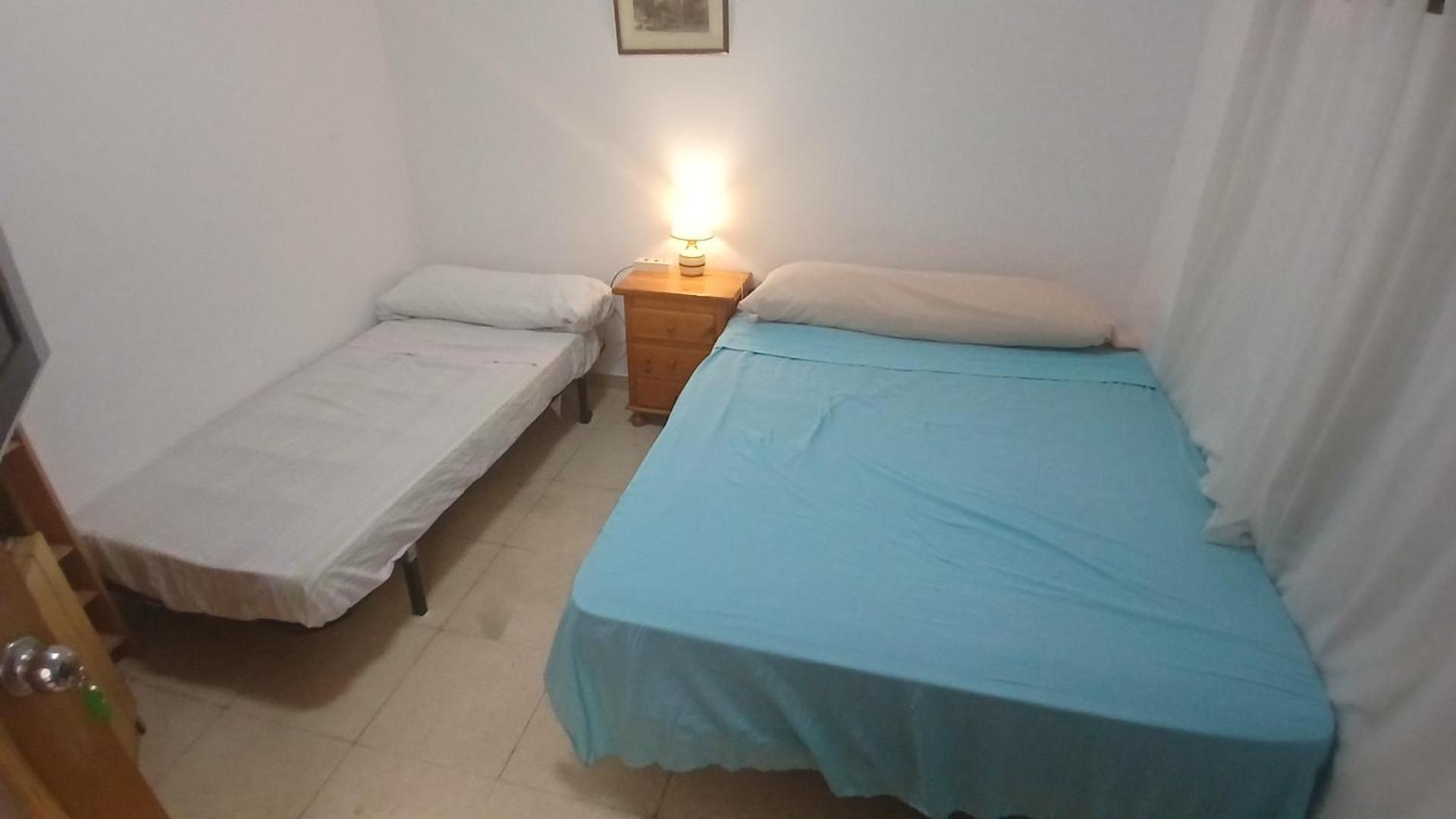 Basic Triple Room with Shared Bathroom