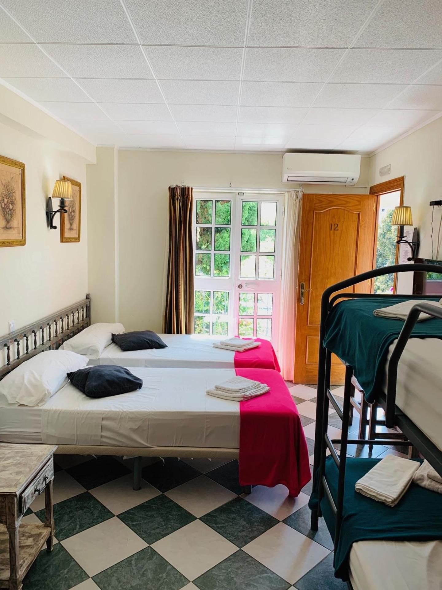 Quadruple Room with Private Bathroom