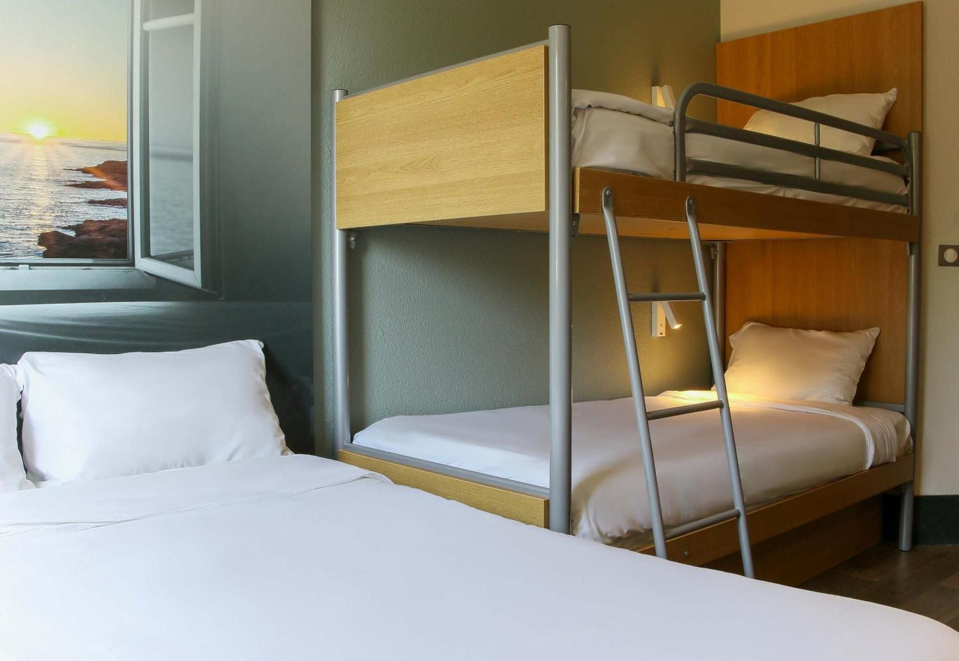 Quadruple Room (2 Adults + 2 Children under 12 Years)