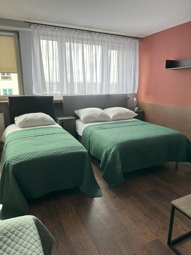 Quadruple Room with Private Bathroom