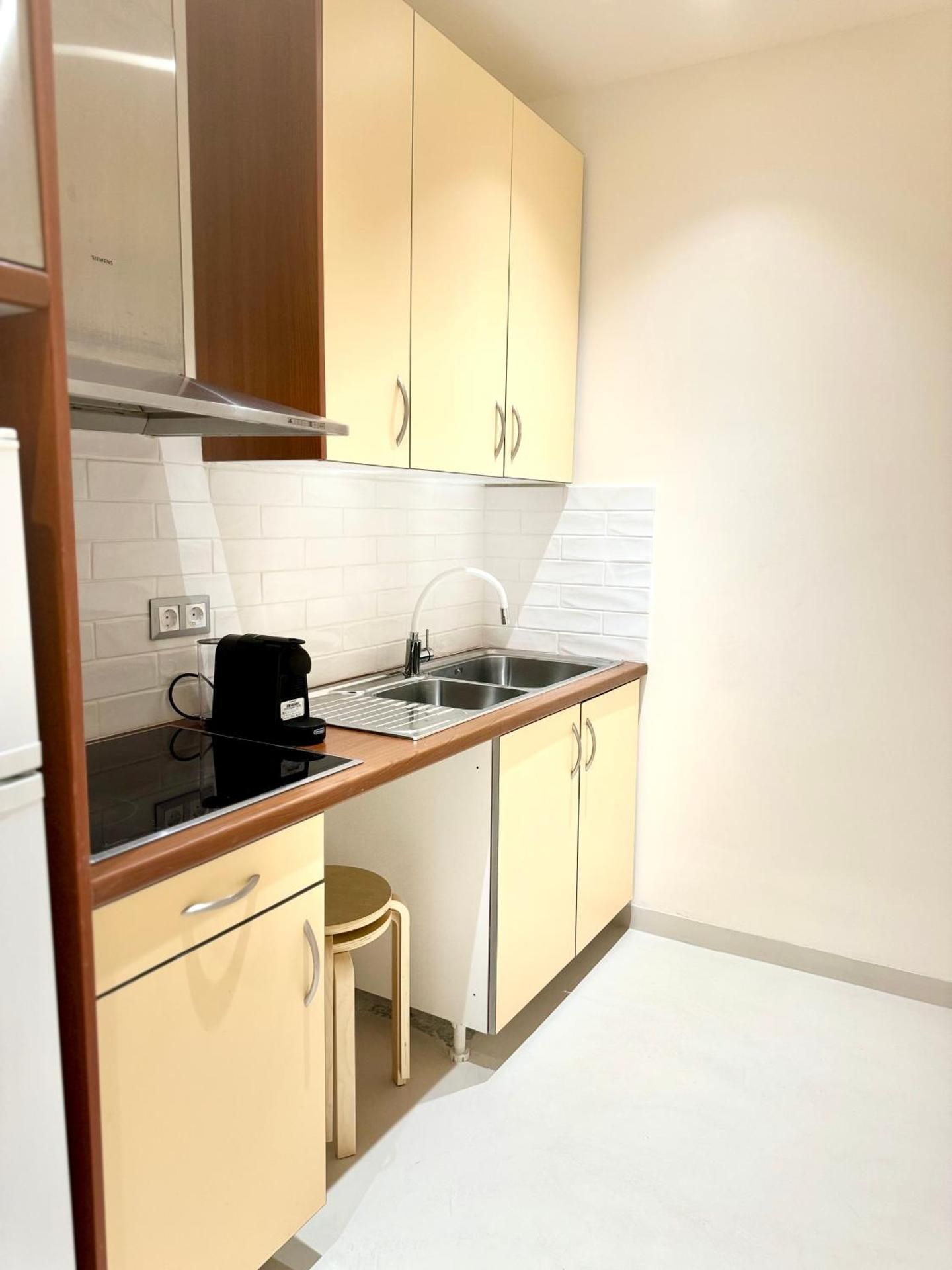 One-Bedroom Apartment with Balcony and City View