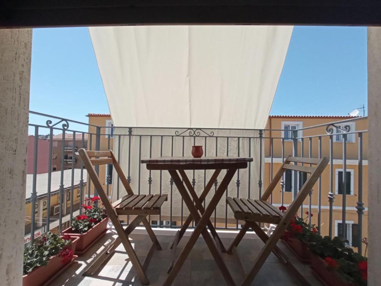 Suite con terrazzo e bagno in comune