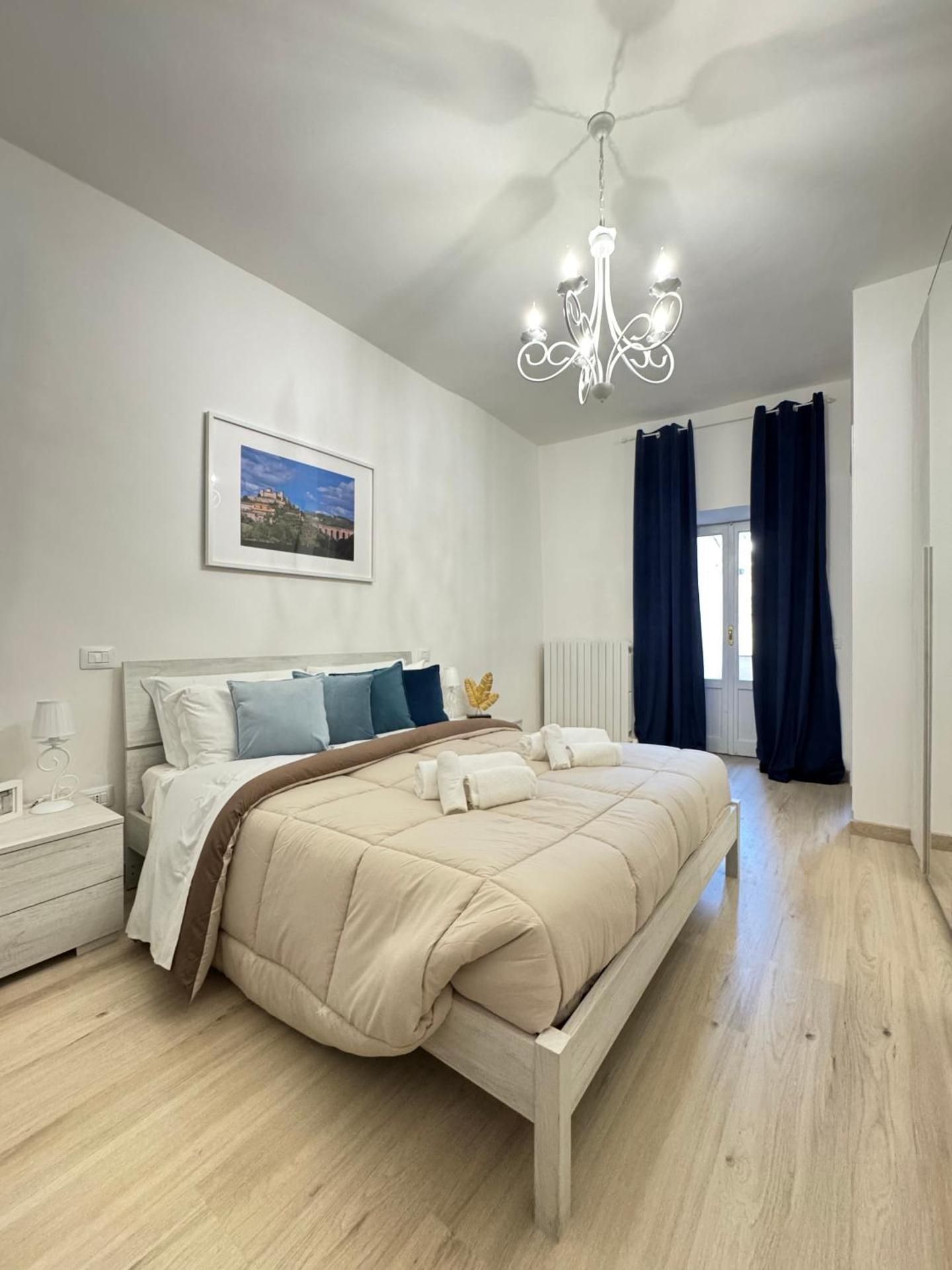 One-Bedroom Apartment with Balcony and City View