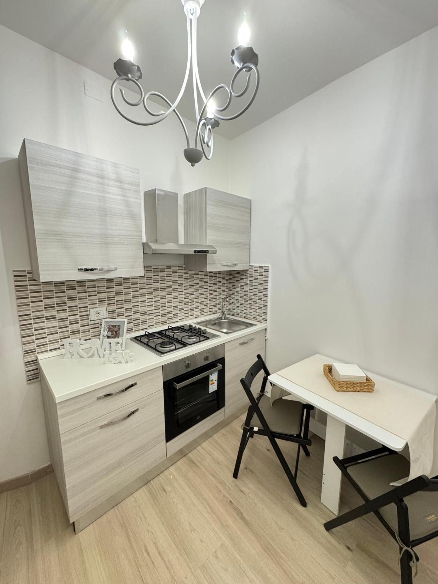 One-Bedroom Apartment with Balcony and City View