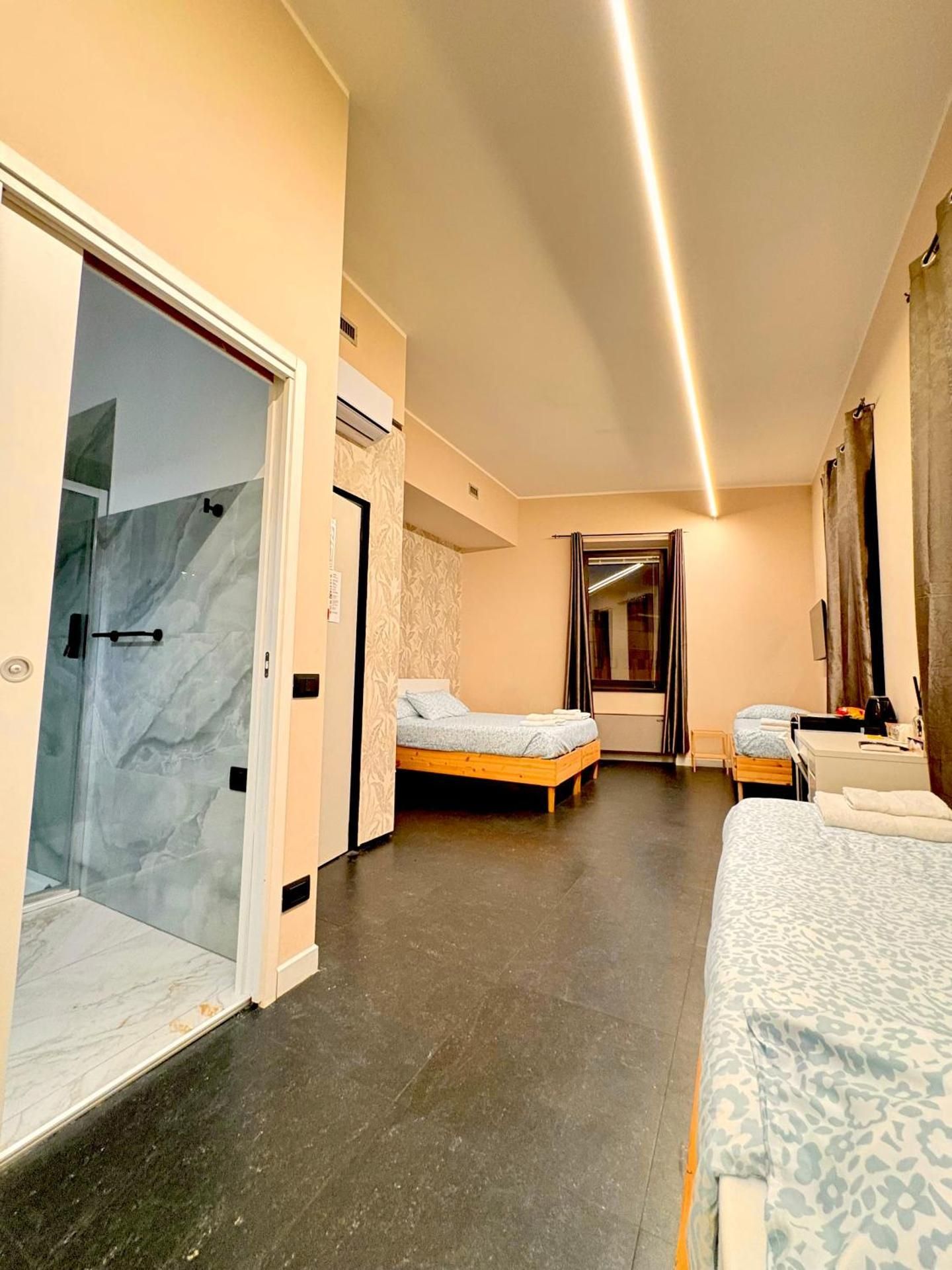 Quadruple Room with Private Bathroom