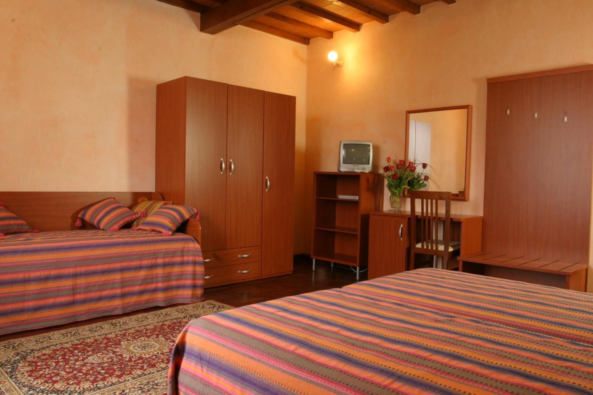 Quadruple Room with Private Bathroom