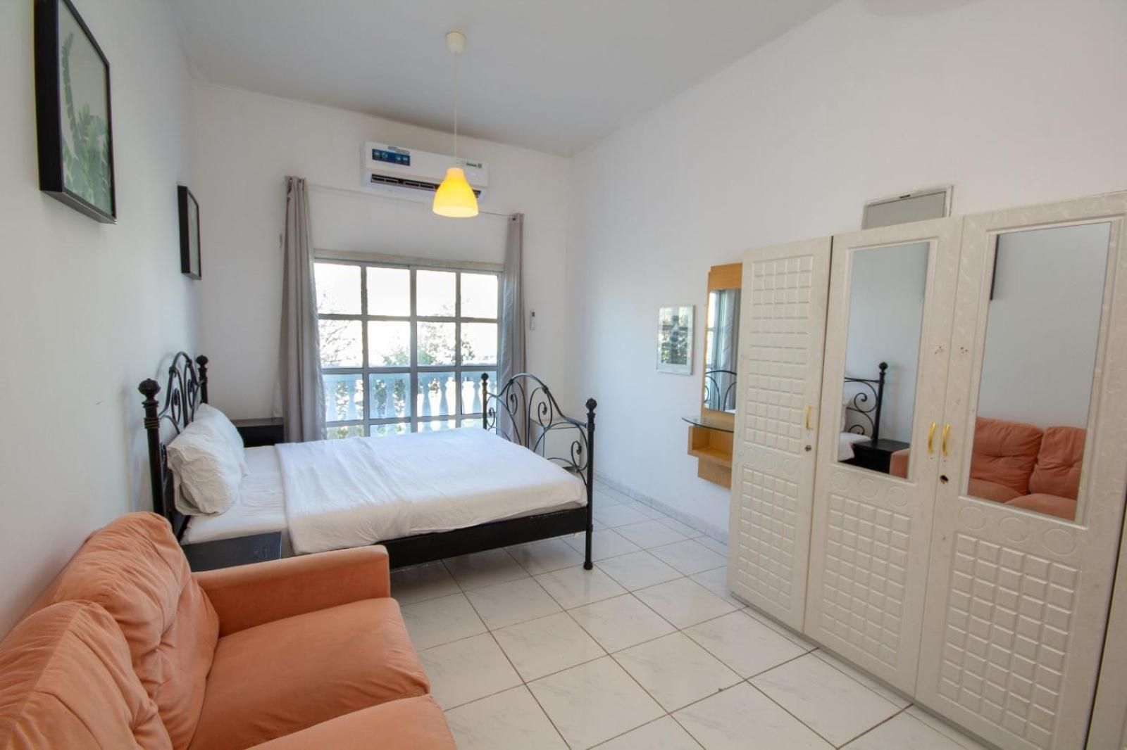 Queen Room with Shared Bathroom