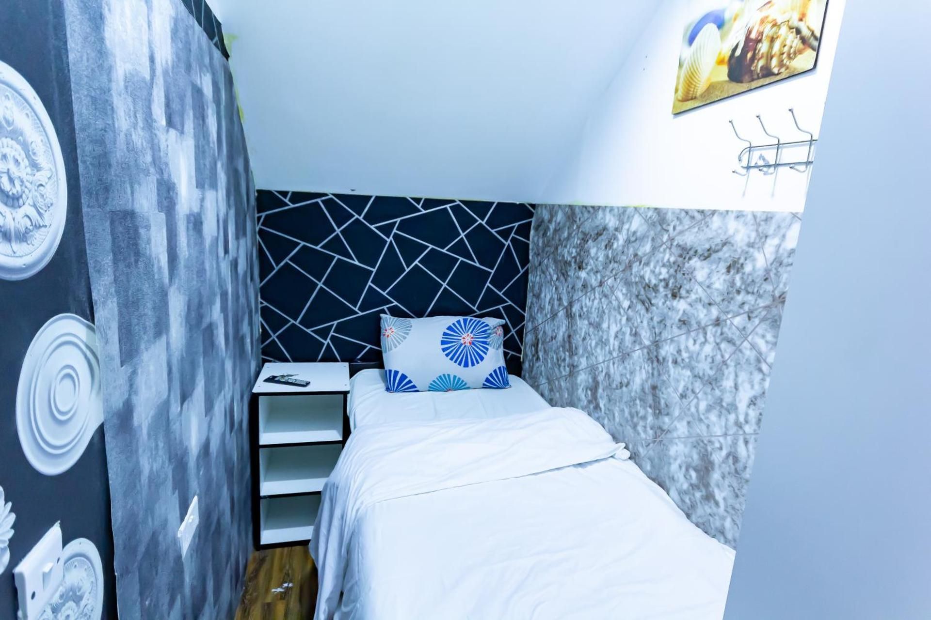 Single Room with Shared Shower and Toilet