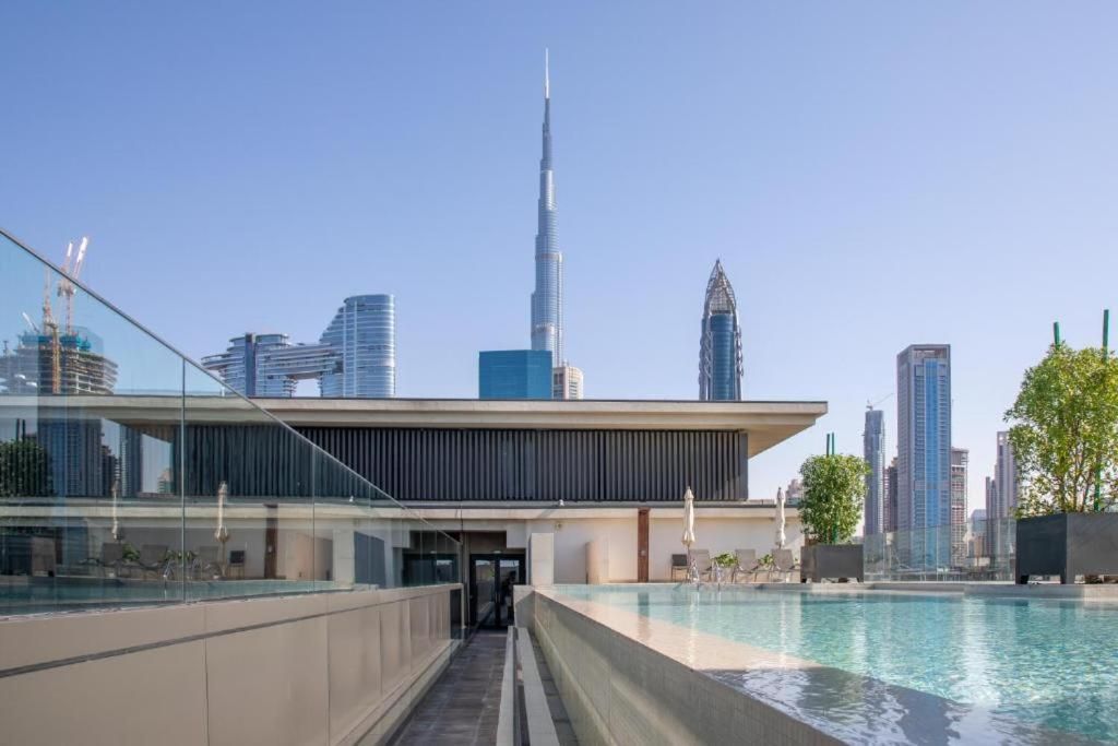 Luxury Apartment with Pool, Patio & Gym in City Walk By AYA Boutique