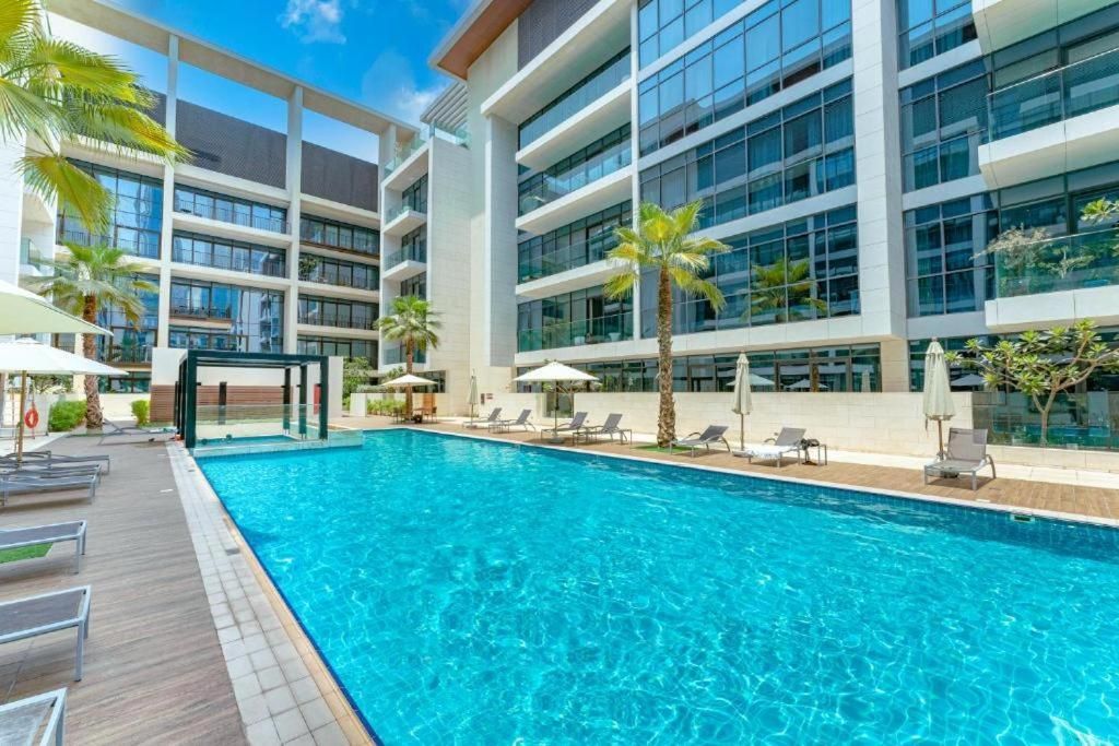 Luxury Apartment with Pool, Patio & Gym in City Walk By AYA Boutique