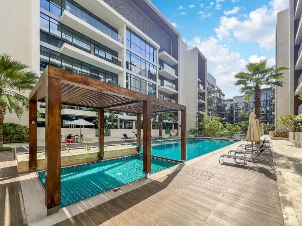 Luxury Apartment with Pool, Patio & Gym in City Walk By AYA Boutique