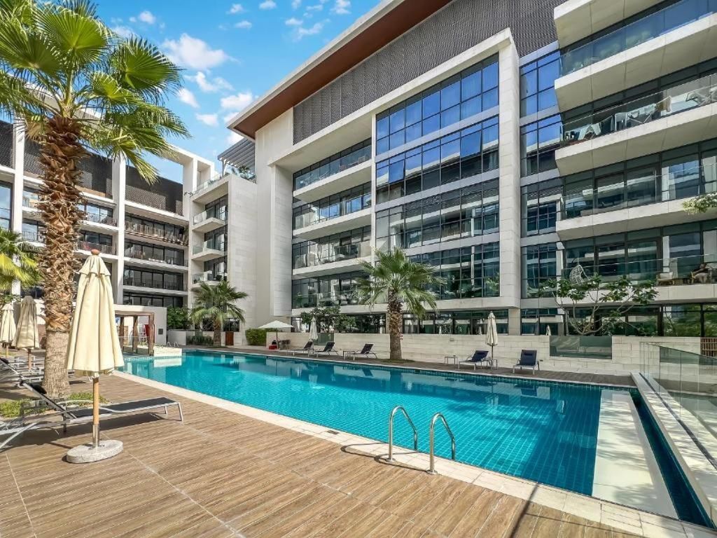 Luxury Apartment with Pool, Patio & Gym in City Walk By AYA Boutique