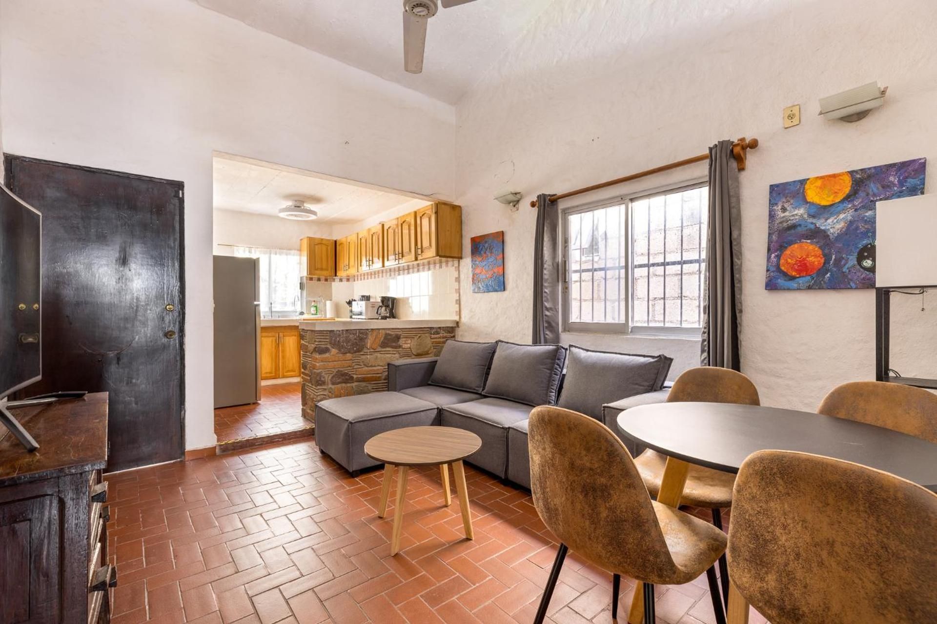 One-Bedroom Apartment with Balcony and City View
