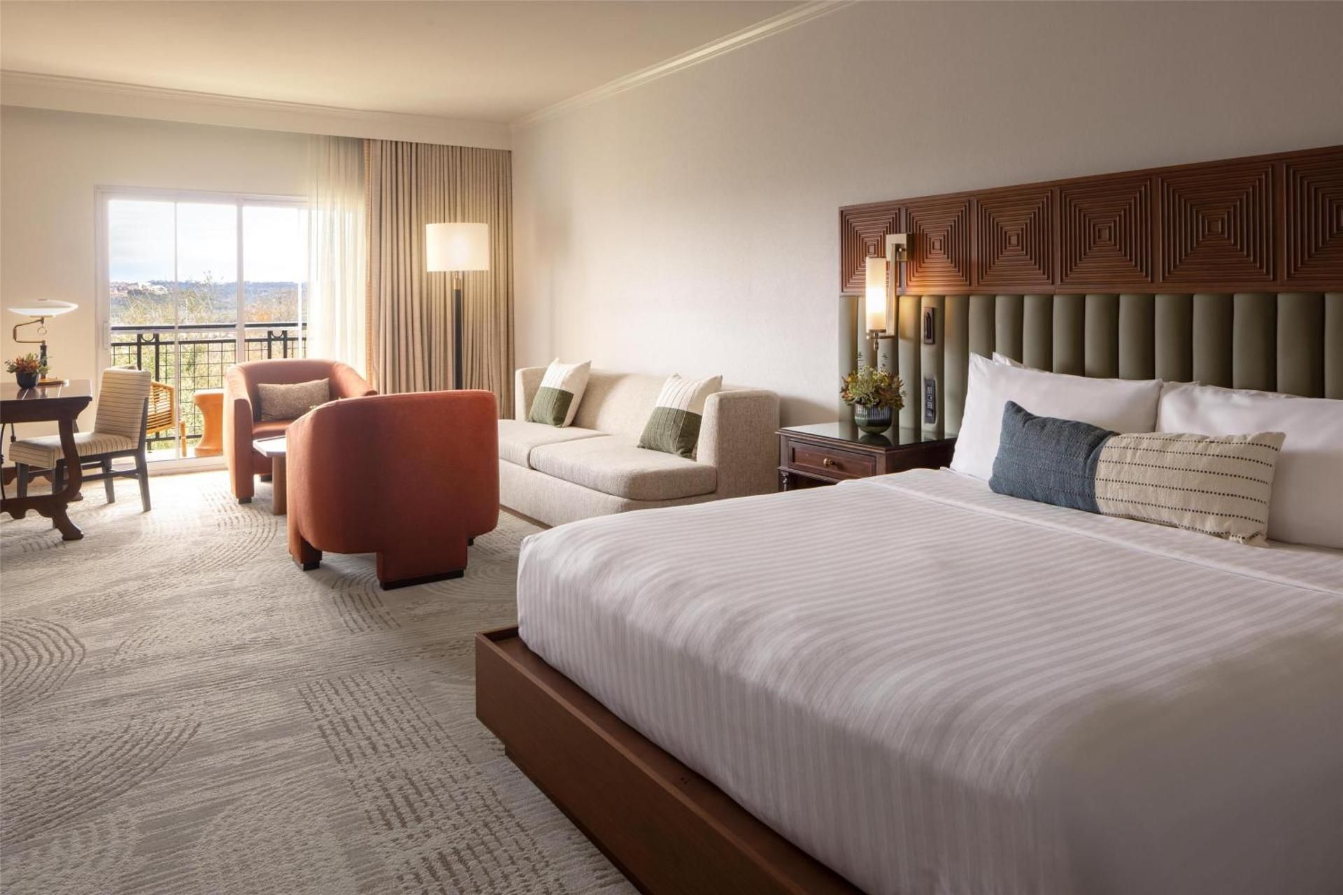 Junior King Suite with Balcony and Pool View