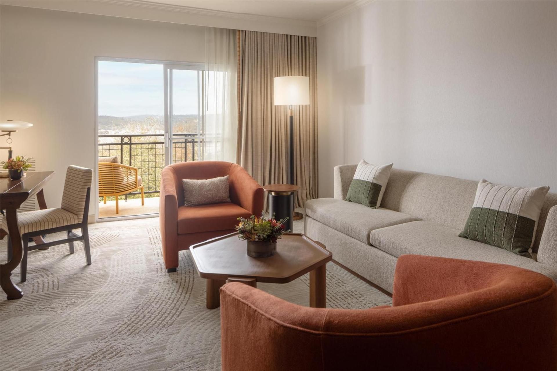 Junior King Suite with Balcony and Pool View