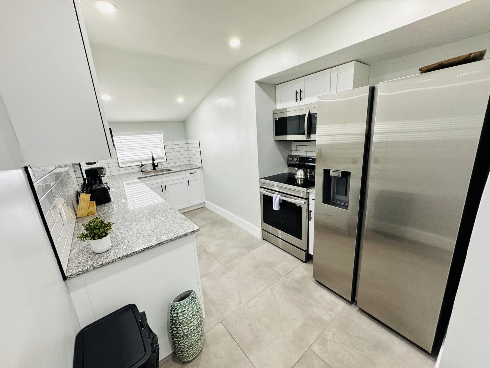 Superior Three Bedroom Two Bath Family Home with Private Backyard