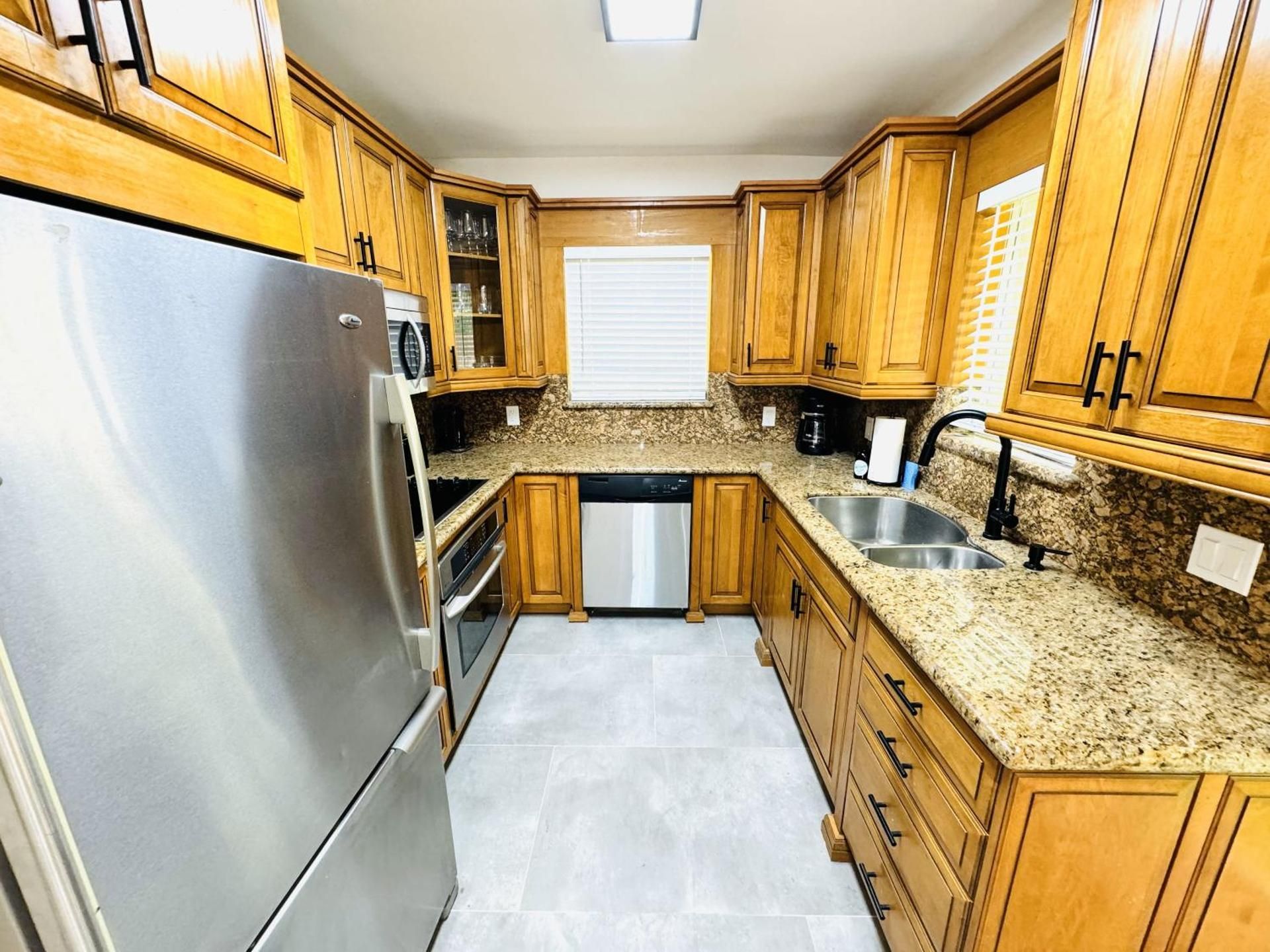 Deluxe Three Bedroom Three Bath, Family Home with Private Backyard
