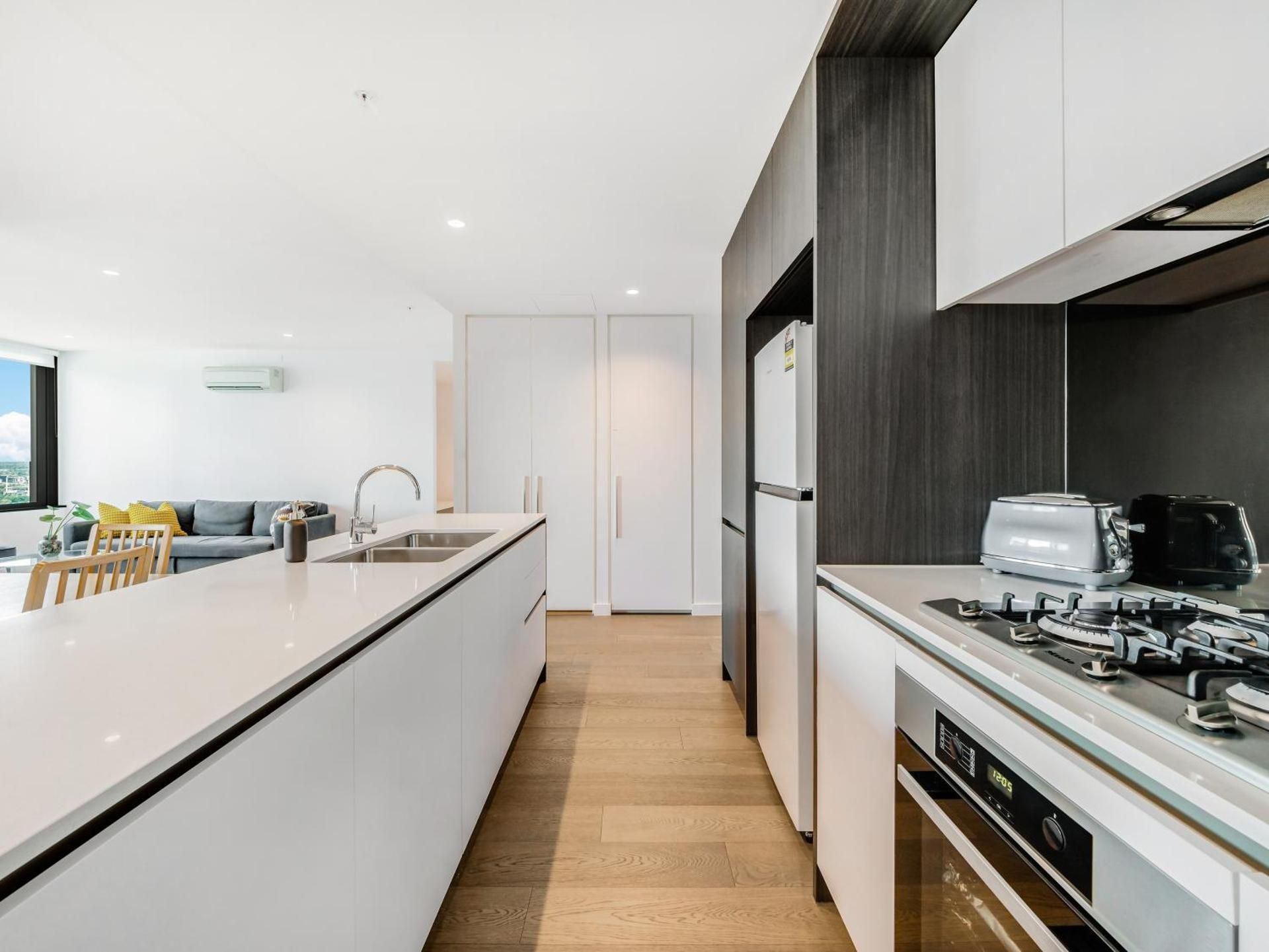 Three-Bedroom Apartment with City and River views