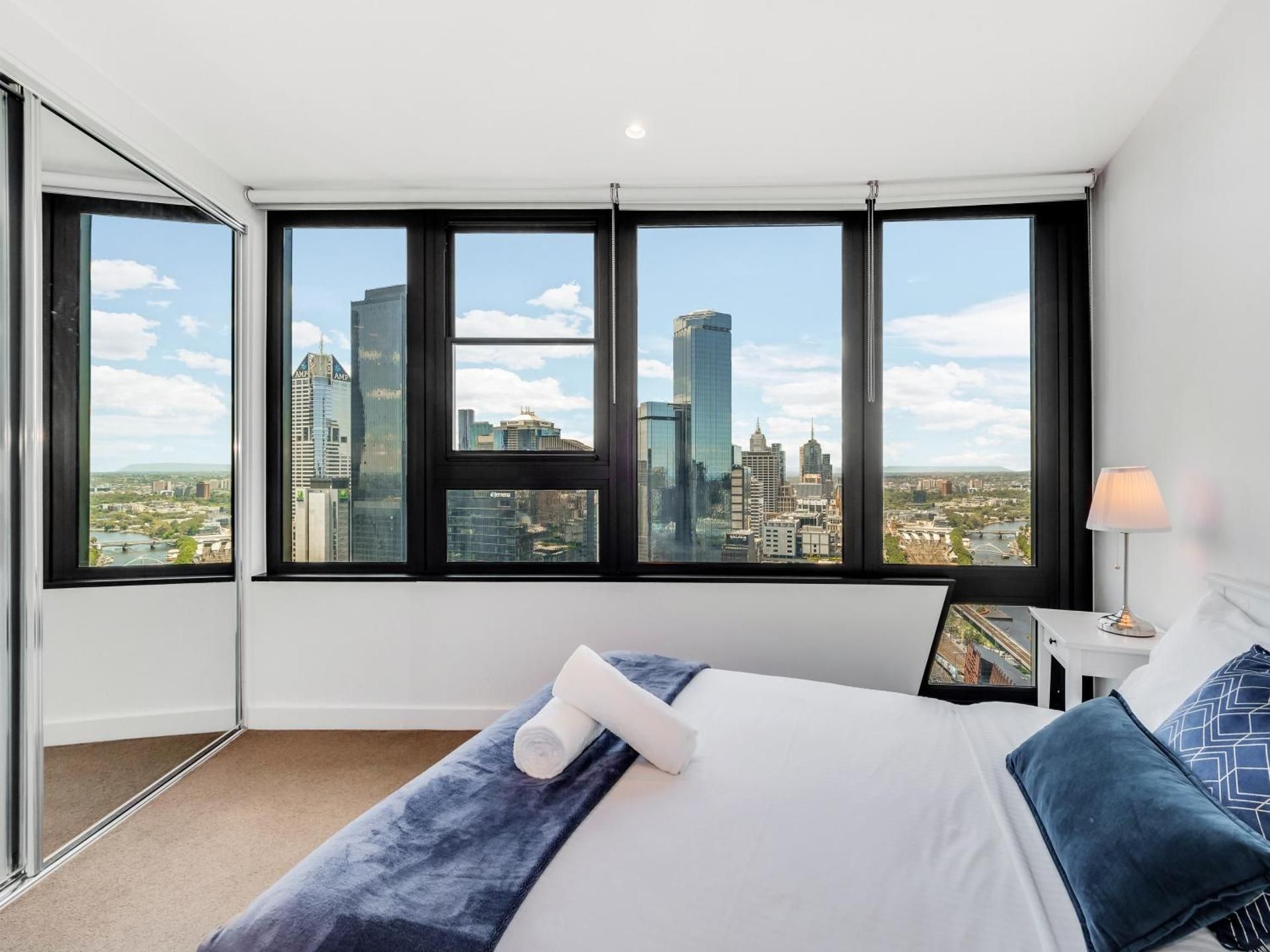 Three-Bedroom Apartment with City and River views