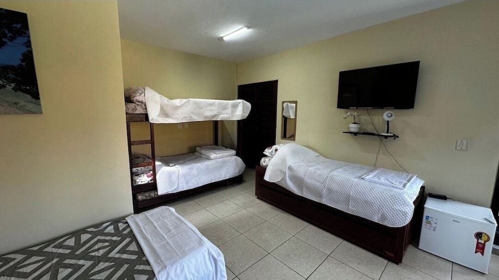 Deluxe Quadruple Room, Balcony, Pool View
