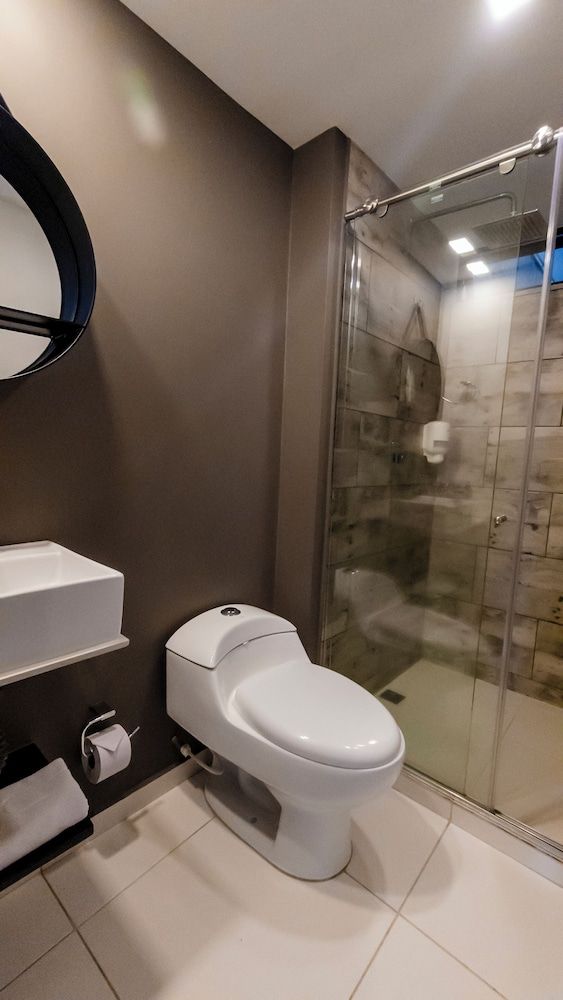 The Coffee Club Hotel Quadruple Room, City View 6