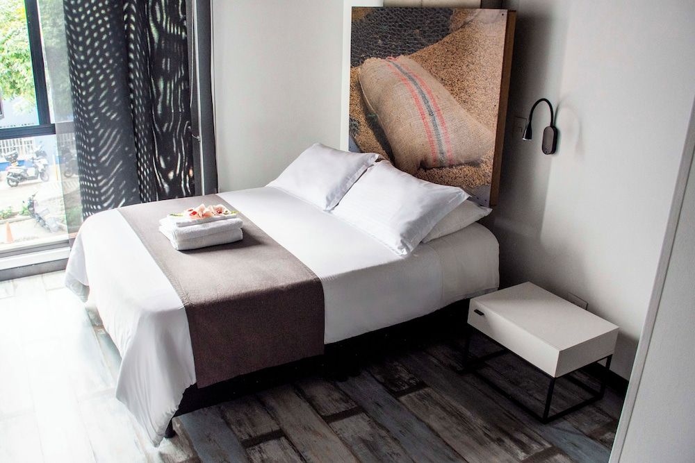 The Coffee Club Hotel Quadruple Room, City View 3