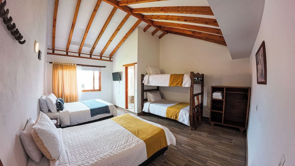 APARTAHOTEL MARGARITAS DE LA VILLA VDL Family Room 10