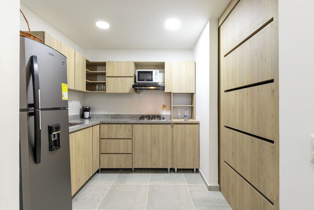 Borbon Suites Standard Apartment, Balcony, Garden View 8