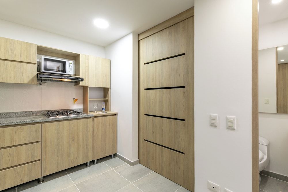 Borbon Suites Standard Apartment, Balcony, Garden View 10