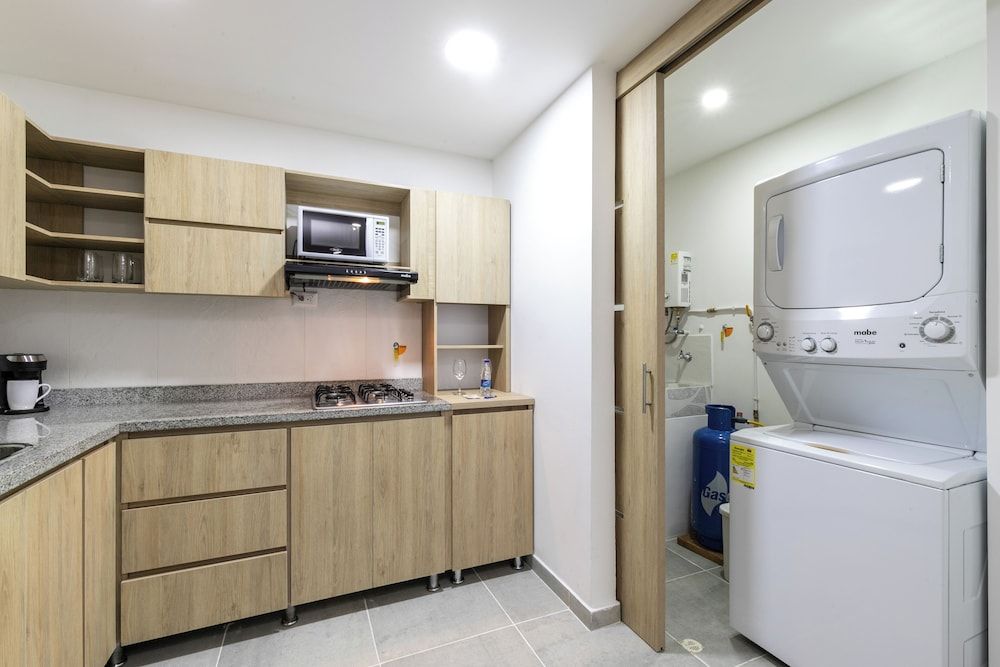 Borbon Suites Standard Apartment, Balcony, Garden View 11