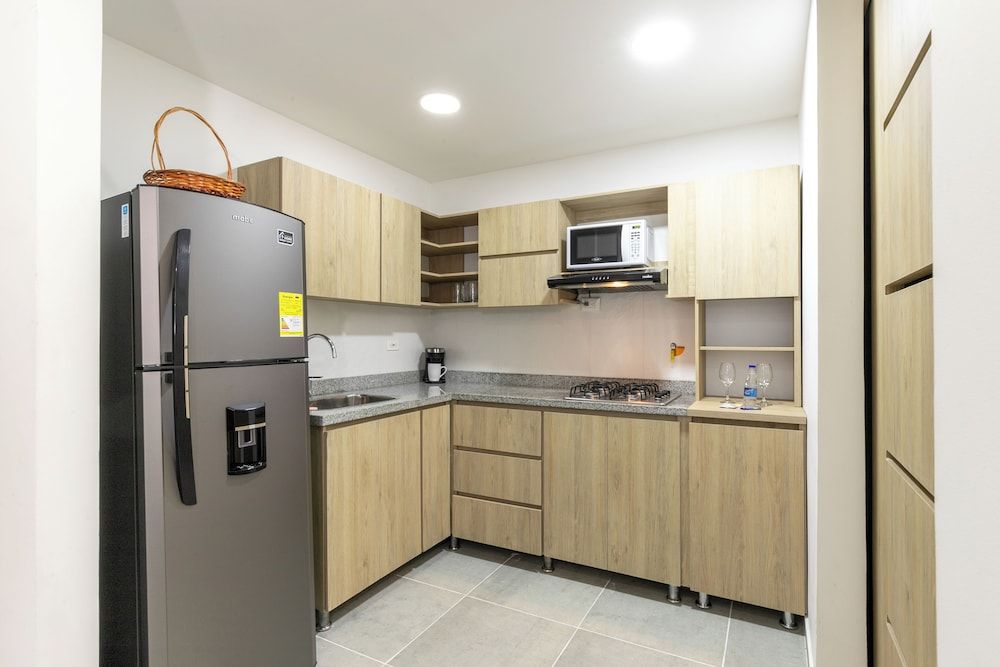 Borbon Suites Standard Apartment, Balcony, Garden View 12