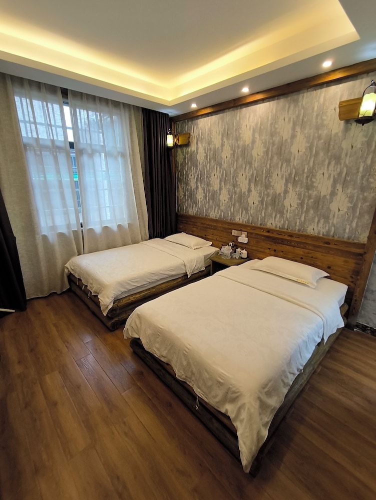 zhangjiejienanfangjinshikezhan Classic Twin Room, Courtyard View 4
