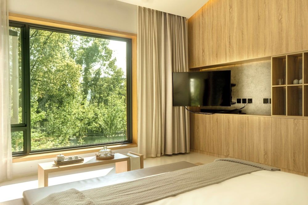 Wangshanlife Snow Garden Design Hotel Deluxe Double Room, Balcony, Garden View 6