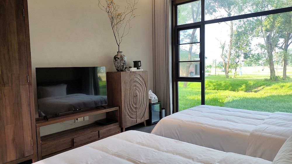 Chaoyangli Minzu Dujia Jiudian Standard Twin Room, Garden View 3