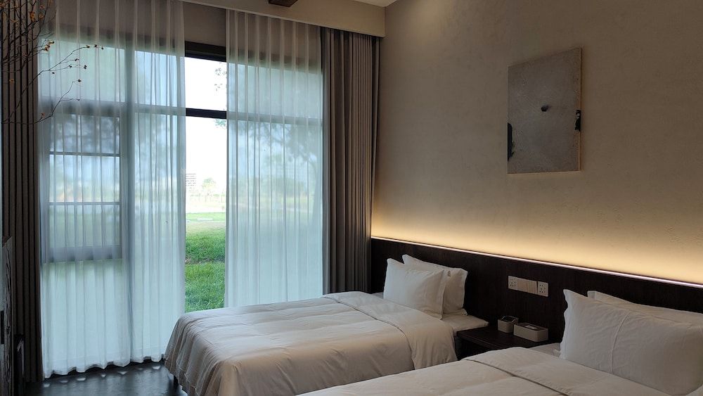 Chaoyangli Minzu Dujia Jiudian Standard Twin Room, Garden View 4