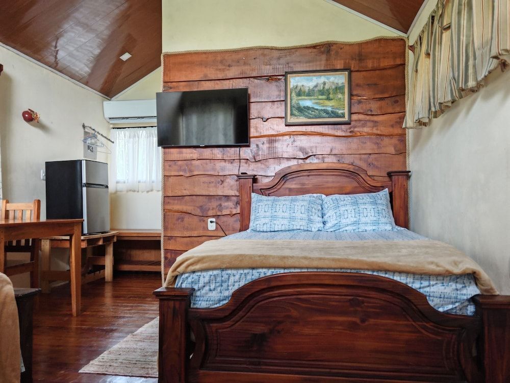 La Cuna Inn Comfort Quadruple Room, Patio, Garden View 3