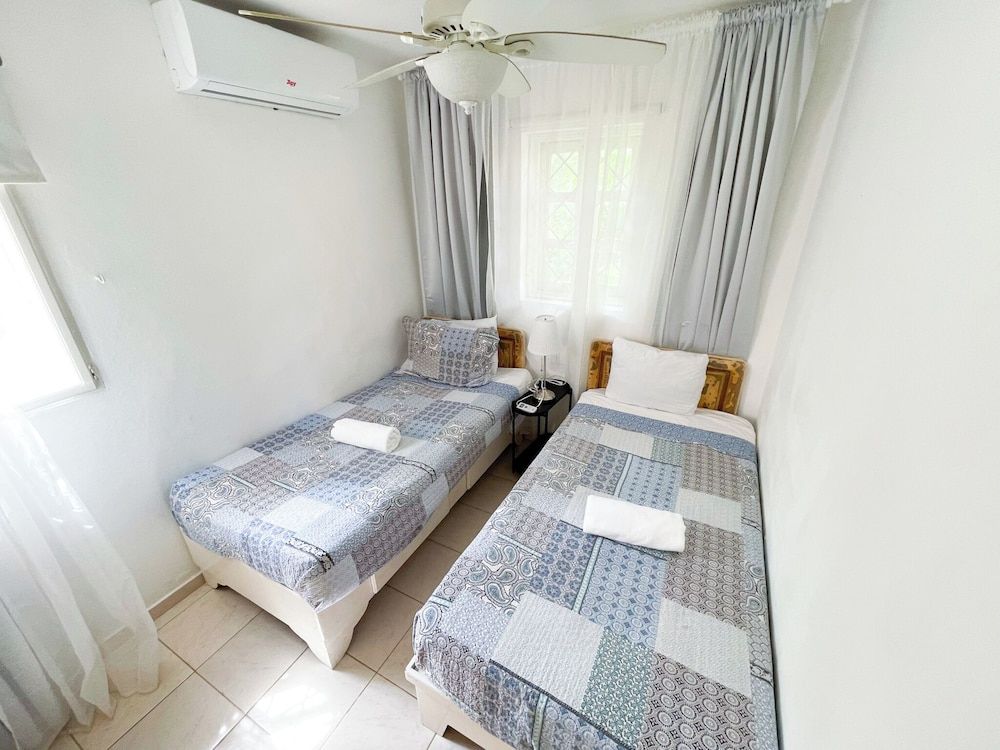 Deluxe Suite, 2 Bedrooms, Pool Access, Garden Area