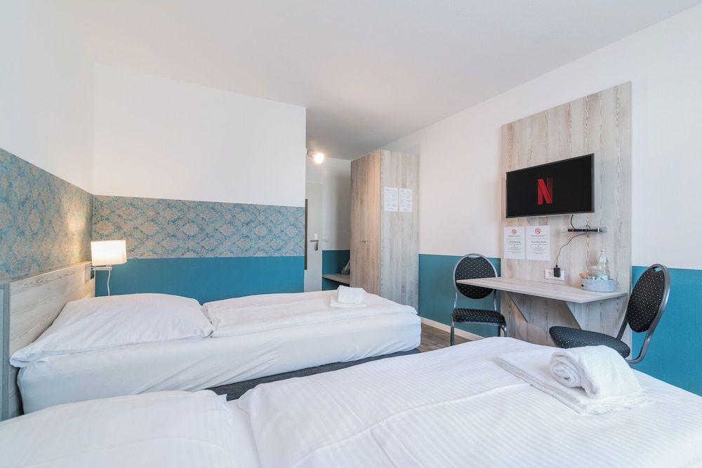 Hotel Café Galerie Comfort Twin Room