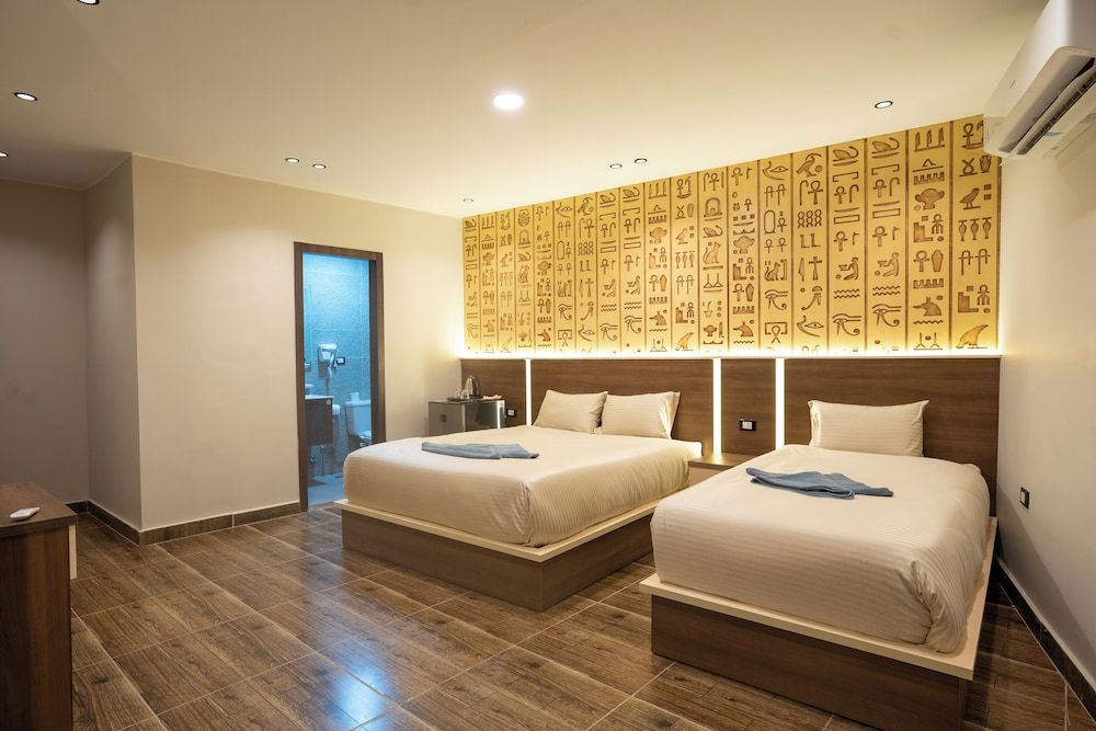 Deluxe Triple Room, Balcony, Garden View