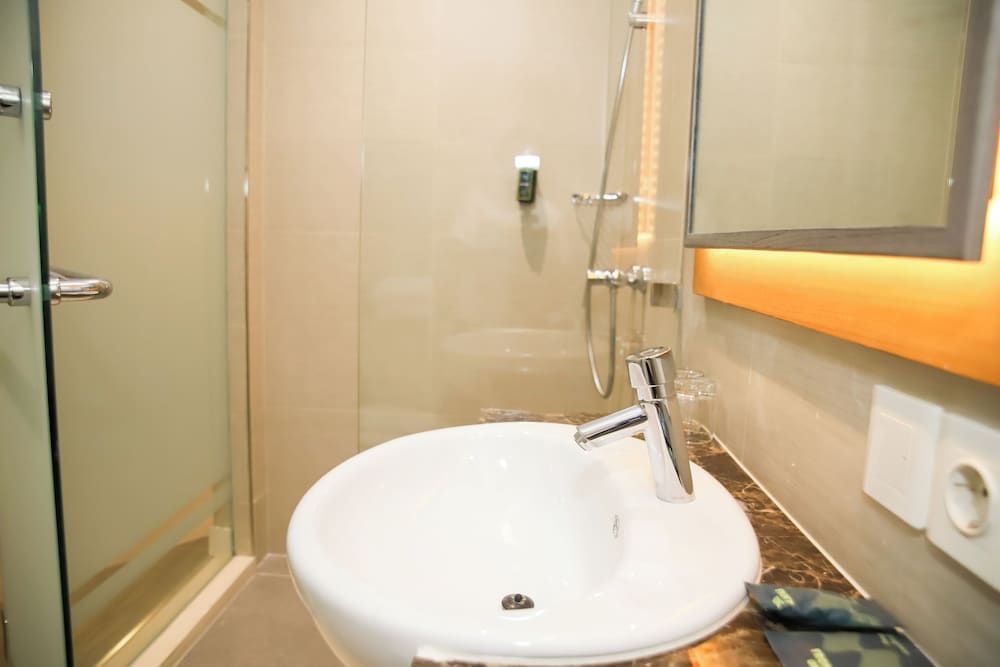 Front One Hotel Papua Lestari Superior Double Room, No Windows 8