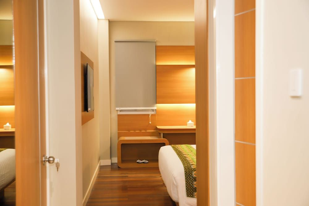 Front One Hotel Papua Lestari Deluxe Double Room 4