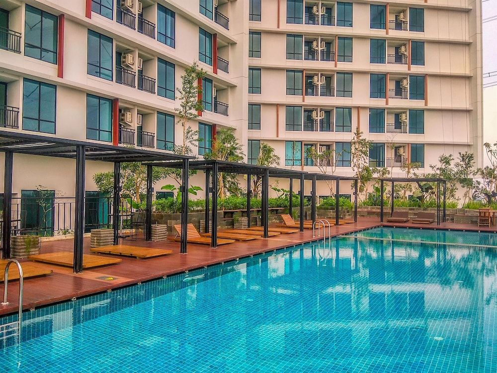 Simple White Designed Studio At Lrt City Bekasi Apartment