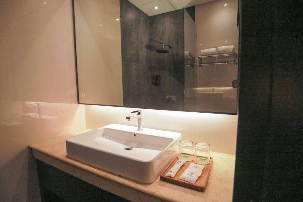 Lotus Garden Hotel by Waringin Hospitality Superior Double Room 4