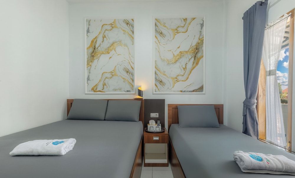 SG Hotel Pangandaran Deluxe Triple Room 3